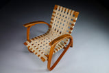 Patinated Lounge Chair in Wood and Canvas by Jan Vanek